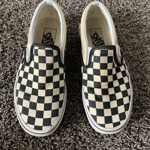 Classic black/off white checkered slip-on vans